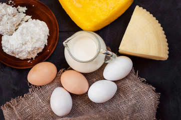 Farm dairy products on table. Top view.