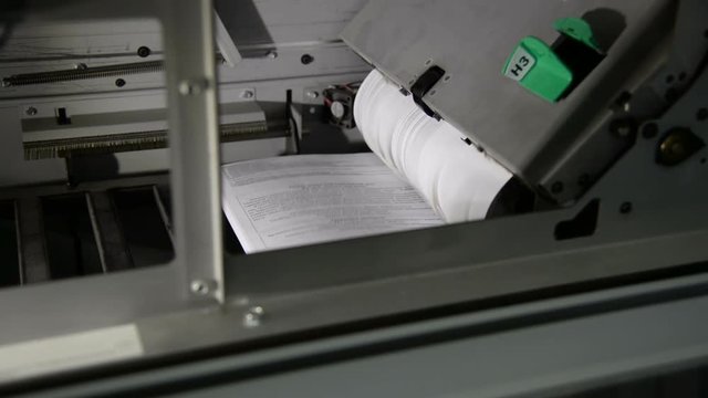 Fast printer printing hundreds of paper invoices