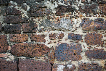 Dilapidated old brick wall