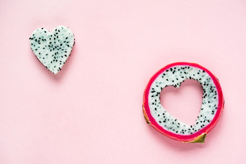 Dragon fruit on the pink background