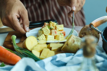 Chef,Chef working at a restaurant and making a salad,To make a salad.