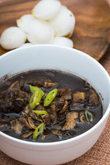 stewed pork blood with pork meat and delicious puto or also known as dinuguan