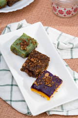 sapin sapin, biko, pandan sticky rice topped with caramelised coconut cream also called as latik