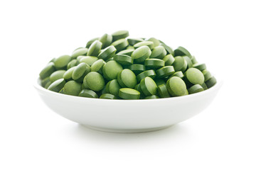 Green chlorella pills or green barley pills.