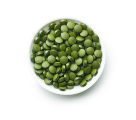 Green chlorella pills or green barley pills.