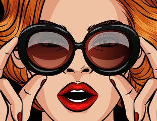 Fototapeta premium Color vector poster in pop art style. Girl with red hair in sunglasses. Lady holds glasses in the style of 60-80s. The girl with her mouth open is surprised. The woman is shocked and scared