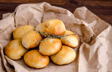 Baked homemade pies in the oven with mashed potatoes and fried onions