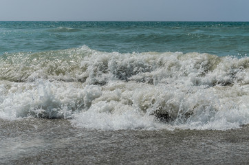 Sea waves on a sandy beach