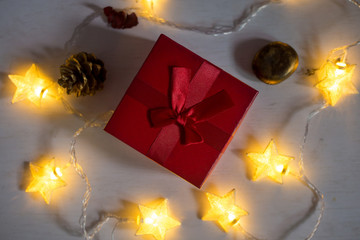 Red gift box with star lamp, christmas concept