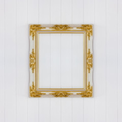 vintage frame on white wooden wall