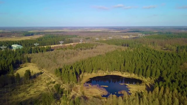 Drone Shot of The Westerbork Synthesis Radio Telescope (WSRT). An aperture synthesis interferometer consisting of a linear array of 14 antennas