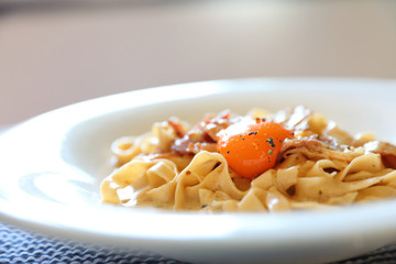 Homemade pasta with white sauce , spaghetti carbonara , italian food