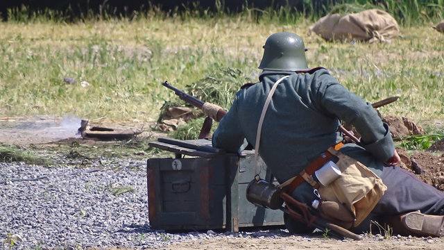 Prussian soldier leads the battle with the enemy. Reconstruction in 2014 of the famous military events of the early 20th century, 1914-18