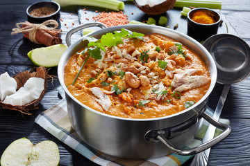 hearty Mulligatawny soup in a metal pot