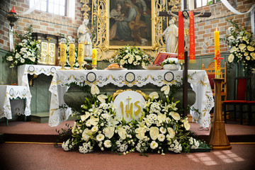 altar in the church prepared for the first communion