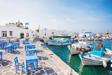 Greek fishing village in Paros, Naousa, Greece. Popular touristic destination - obrazy, fototapety, plakaty