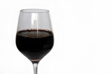 Glass of red wine isolated on white. Background for restaurant menu, wine production concept, liquor store