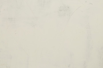 putty white on the wall. the skin has a scratch texture