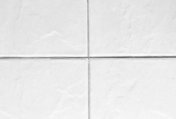 colored floor tile white with white grout background.