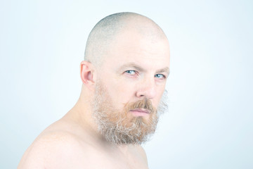 Obraz premium portrait of a bearded man on a light background