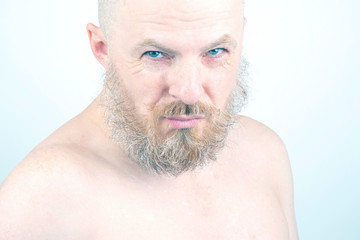 Obraz premium portrait of a bearded man on a light background