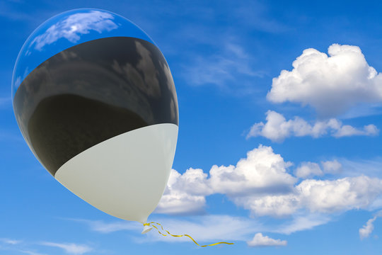 Balloon with the image of the state flag of Estonia against the blue sky. - Powered by Adobe