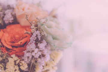 Selective focus of beautiful colorful flowers with summer bokeh background.vintage color style.