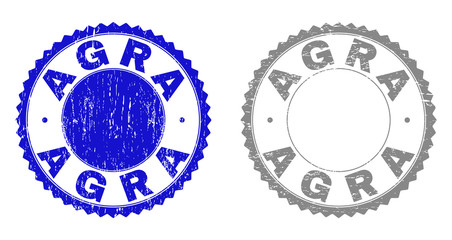 AGRA stamp seals with grunge texture in blue and grey colors isolated on white background. Vector rubber watermark of AGRA label inside round rosette. Stamp seals with retro styles.