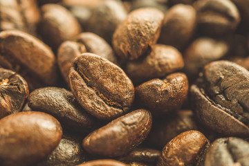 Roasted coffee beans closeup background