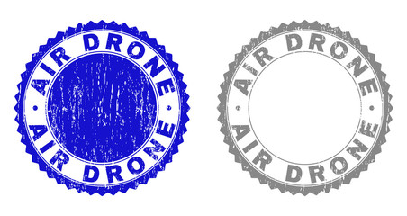 AIR DRONE stamp seals with distress texture in blue and gray colors isolated on white background. Vector rubber imprint of AIR DRONE label inside round rosette. Stamp seals with dust styles.