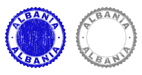 ALBANIA stamp seals with grunge texture in blue and grey colors isolated on white background. Vector rubber imitation of ALBANIA label inside round rosette. Stamp seals with unclean textures.