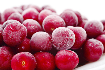Group of frozen cherries.