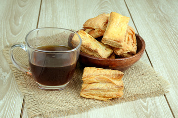 Salty crispy puff with a cup of tea, breakfast, tea-time