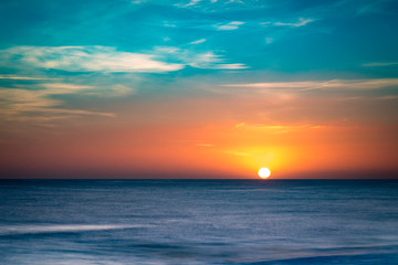 golden and red skies over the mediterranean sea from Valencia in spain in europe on a cold crisp winter day
