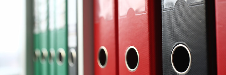 Book shelf full of file folder in office closeup