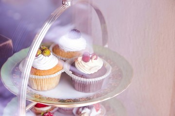 various cakes on a beautiful stand