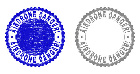 AIRDRONE DANGER! stamp seals with grunge texture in blue and gray colors isolated on white background. Vector rubber imitation of AIRDRONE DANGER! label inside round rosette.