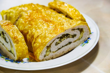 the freshly cooked meat rolls on a plate