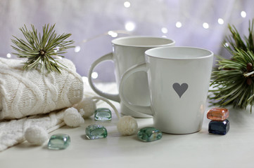 Gentle composition. Cup of tea on a warm cozy background.