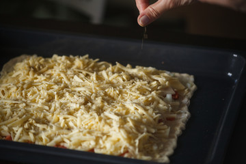 woman prepearing homemade fish pie with popato