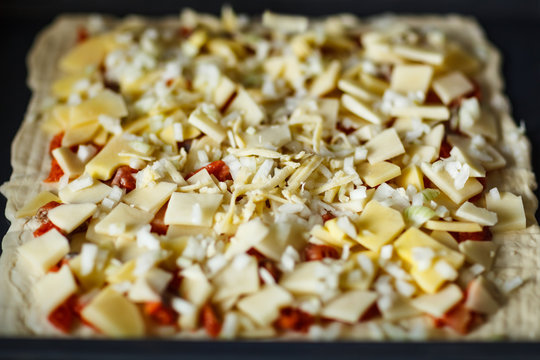 woman prepearing homemade fish pie with popato