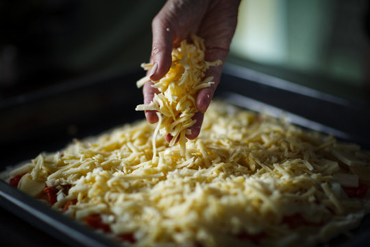 woman prepearing homemade fish pie with popato