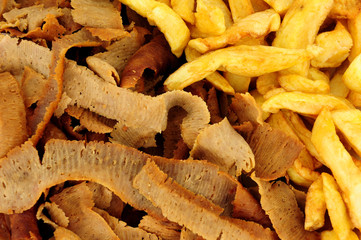 Lamb and beef gyro kebab meat slices and chips background