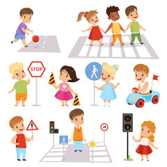 Cute Smiling Boys and Girls Crossing Streets and Learning Road Signs set, Traffic Education, Rules, Safety of Kids in Traffic Vector Illustration