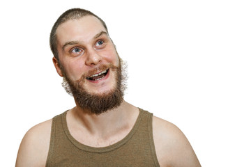 close-up face portrait of smiling happy bearded unshaven guy on white isolated background