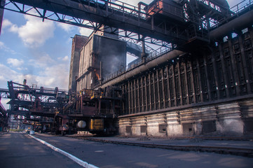 the coke pusher pushes the coke. Coke oven battery. coke and chemicals plant/
