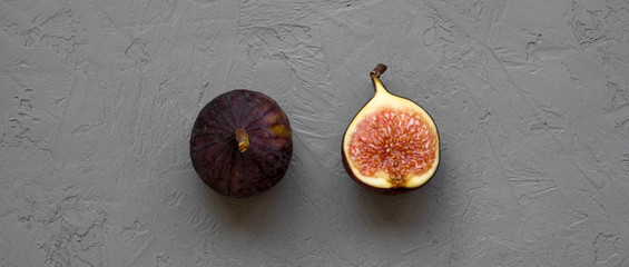 Fresh figs on concrete background, top view. Overhead, from above.