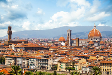 Fototapeta na wymiar Landscape of Florence in Italy with the ancient tower of Old Palace Palazzo Vecchio, Florence Duomo, Basilica di Santa Maria del Fiore. Firenze landmarks