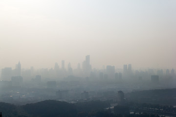 Naklejka premium City landscape of Nanjing in China in fog