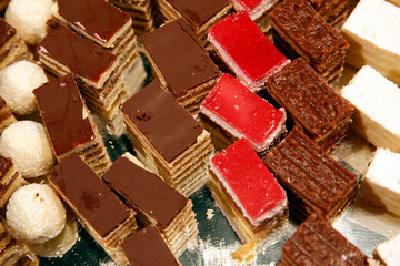 Colorful desserts and pastry served on a wedding party